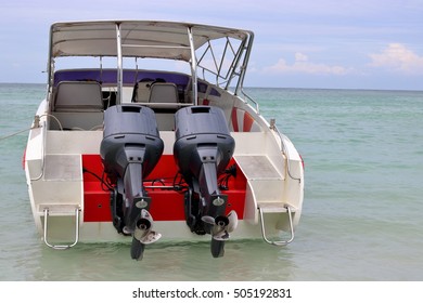 Behind View Of Speed Boats Or Personal Water Craft In The Sea 