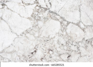 Beige background texture of a marble wall. Texture in the form of a web.