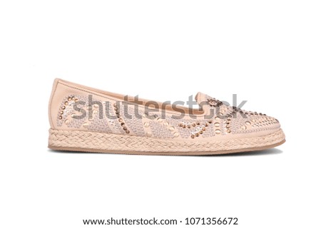 Beige ballerina flats isolated on white background. Spring summer female casual shoes