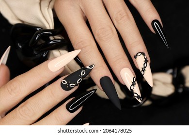 Beige And Black Manicure On Long Nails.