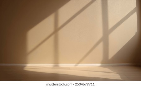 Beige blank wall interior background, with shadow from window. Background concept studio and backdrops show products.