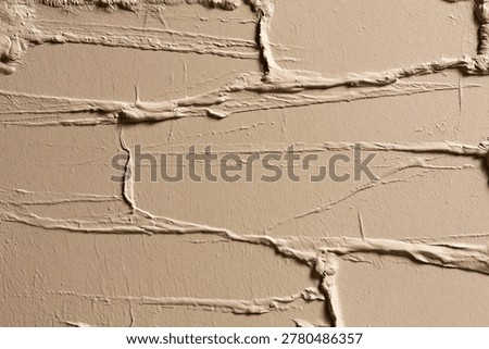 Beige Brick Patterned Plaster with Embossed Relief Lines