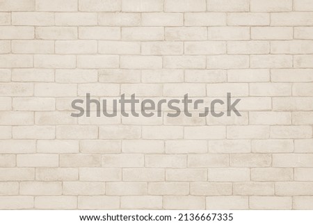Beige brick wall texture background. Brickwork and stonework flooring backdrop interior design home style vintage old pattern clean with concrete uneven color beige bricks stack decoration.