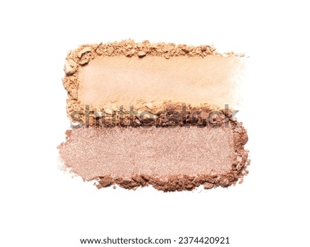 Beige and brown eye shadow texture swipe isolated on white background. Cosmetic product brush swatch