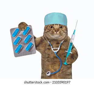 A beige cat doctor in a medical hat with a stethoscope holds a syringe and a blue pill packaging. White background. Isolated.