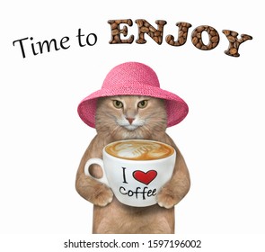 The beige cat in a pink straw hat is holding a big cup of coffee latte. Time to enjoy. White background. Isolated. - Powered by Shutterstock