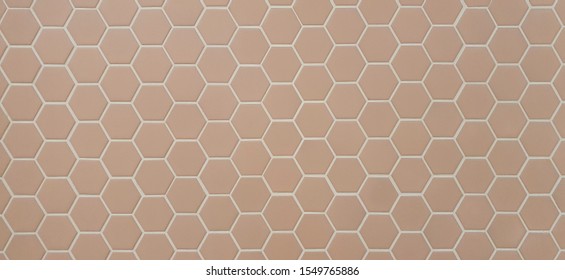 Beige Ceramic Bathroom Wall Tile. Hexagon Mosaic Tiles Texture With White Filling.