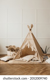 Beige Children's Wigwam In The Room On The Floor Scandinavian Style With Decor