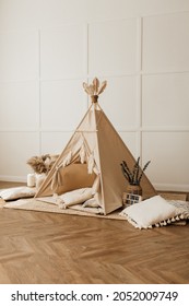 beige children's wigwam in the room on the floor Scandinavian style with decor - Shutterstock ID 2052009749