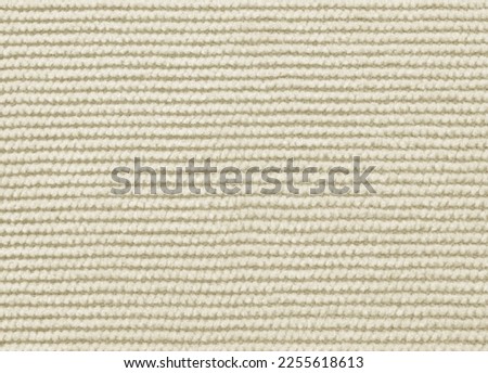 Beige color corduroy fabric texture as background