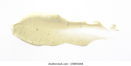 Beige color scrub cream stroke on background
