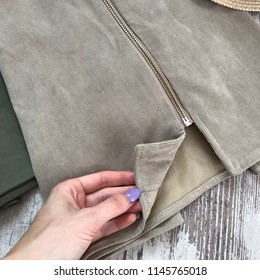 Beige Corduroy Skirt Close-up On A Wooden Background