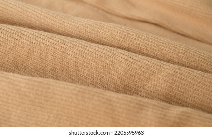 Beige Cotton Jersey Fabric Background Above