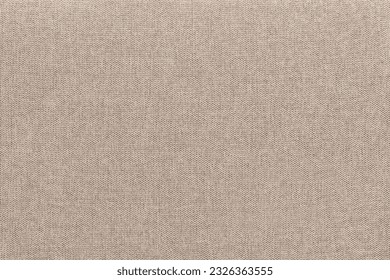 Beige cotton woven sofa cushion fabric texture background. High resolution photograph
