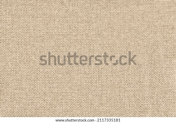 Beige cotton woven sofa cushion
fabric texture background. High resolution
photography