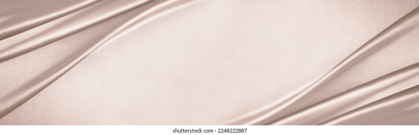 Beige cream silk satin. Draped fabric. Light pale brown luxury background with space for design. Flat lay, top view table. Template.Wide banner. Panoramic. Soft folds. Sepia toned.Vintage retro style. - Shutterstock ID 2248222887