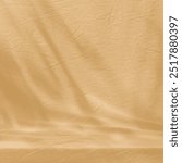 Beige creased fabric, cloth with abstract light reflections.