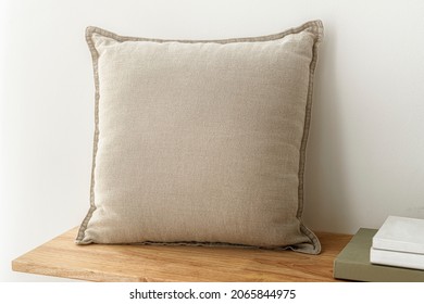 Beige cushion home decor, on a bench