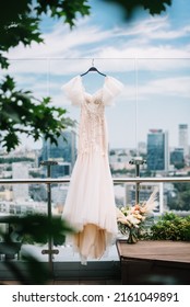 Beige Handmade Casual Wedding Dress Hang On The Glass Veranda City View
Bride's Morning 