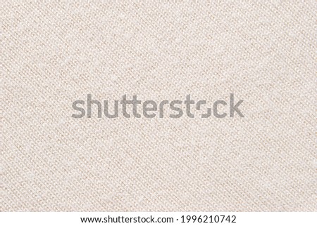 Beige jersey fabric texture as background