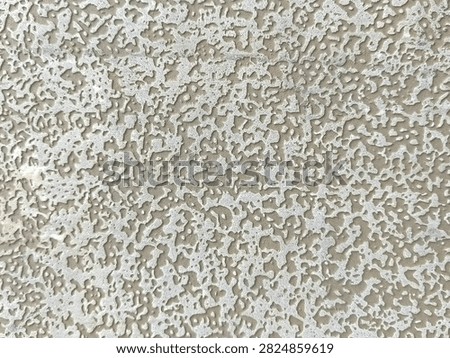 Beige knockdown stucco wall texture architectural plaster background