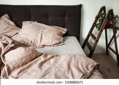 Beige Linen Bed Sheets In The Bedroom