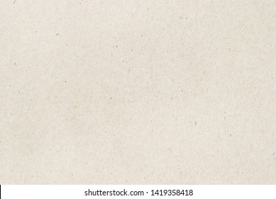 Beige recycled craft paper texture as background