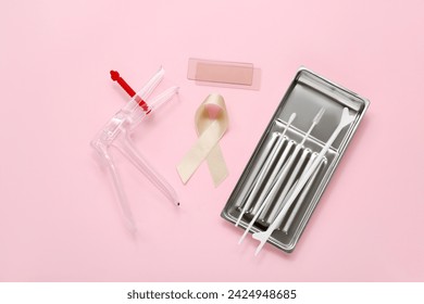 Beige ribbon with gynecological tools on pink background. Uterine cancer awareness concept - Powered by Shutterstock