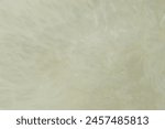 beige sheepskin texture with soft hairs, natural fur for the designer, the concept of processing, production of furrier products, stress relief, psychological stress