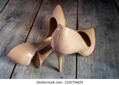 Beige Shoes With A Broken Heel