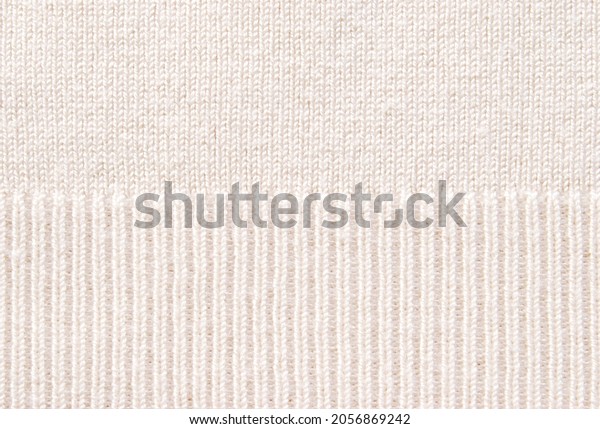 Beige soft knit\
pattern texture as\
background