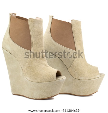 Beige suede high heel women shoes isolated on white background.