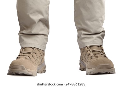 Beige tactical desert boots and ripstop pants, khaki tan suede leather army combat footwear and trousers, brand new casual men's clothing, large detailed isolated SOF apparel closeup, white background - Powered by Shutterstock