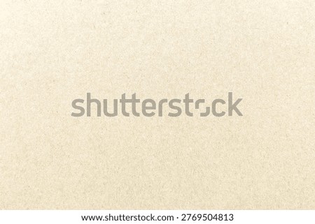 Beige textured paper background with a subtle grainy texture, ideal for vintage or minimalist designs.