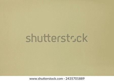 Beige wall, texture, background. The building wall, painted with pale water-based paint. Unsmooth but flat surface in yellowish color with a little stains and strokes. Old backdrop of creamy color