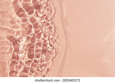 Beige water surface background. Water texture with splashes and bubbles. Summer nature background