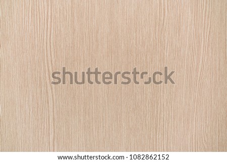 Beige wood background.