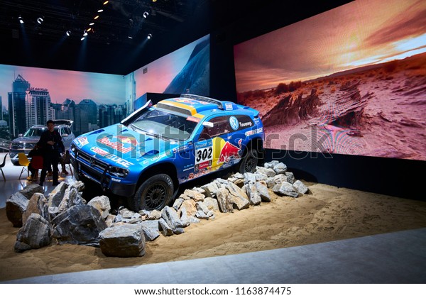Beijing, Asia, China, March 23, 2018: In\
the car booth in Beijing, the Touareg car modification of the\
German car brand was exhibited for people to\
watch.