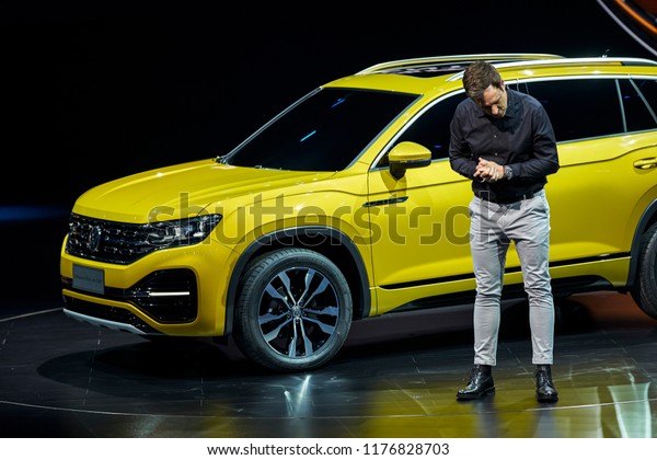 Beijing, Asia, China, March 23, 2018: German car
designers broadcast live on the stage of the auto show center in
Beijing to explain the new models that Volkswagen intends to launch
in the Chinese market