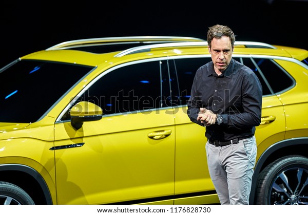 Beijing, Asia, China, March 23, 2018: German car
designers broadcast live on the stage of the auto show center in
Beijing to explain the new models that Volkswagen intends to launch
in the Chinese market