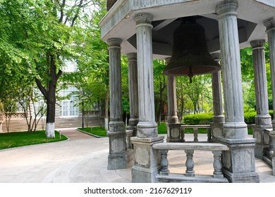 Beijing, China - 05.11.2019 : Stone Gazebo With An Old Bell In The Center Of The City Square.