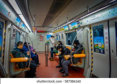 BEIJING, CHINA - 29 JANUARY, 2017: Inside subway train, people sitting around, public transportation concept.