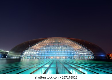 BEIJING, CHINA - APR 3: National Centre for the Performing Arts NCPA at night on April 3, 2013 in Beijing, China. Cost 2.8B CNY, it seats 5,452 people. The first performance was held in December 2007