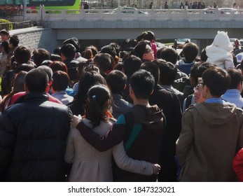 Beijing, China - April 3, 2012 : People Are Lining Up For Buses On Golden Week.