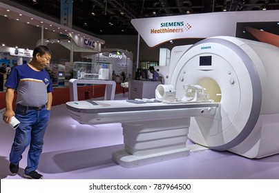 BEIJING, CHINA- AUGUST 19, 2017: A Visitor Takes A Look Of A Scanner MAGNETOM Amira At The Siemens Healthineers Booth During The China International Health Industry Expo (CHINA-HOSPEQ 2017)