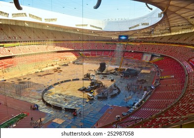 BEIJING, CHINA, AUGUST 20, 2013: Workers Are Constructing New Stage Inside Of The Birds Nest Olympic Stadium In Chinese Beijing.