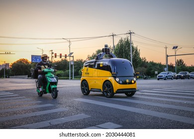 Beijing, China - August 21, 2021: Chinese Food Delivery Giant And Ecommerce Platform Meituan Is Testing Their Autonomous Delivery Vehicle In Beijing.