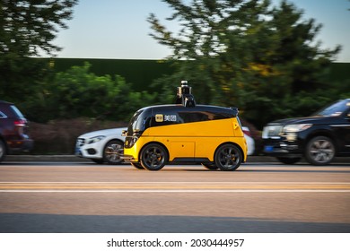 Beijing, China - August 21, 2021: Chinese Food Delivery Giant And Ecommerce Platform Meituan Is Testing Their Autonomous Delivery Vehicle In Beijing.