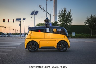 Beijing, China - August 21, 2021: Chinese Food Delivery Giant And Ecommerce Platform Meituan Is Testing Their Autonomous Delivery Vehicle In Beijing.