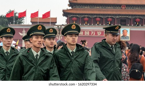 Beijing, China - Circa October 2017: A Patrol Of Guards Walk On At Tiananmen Square During The Chinese Golden Week